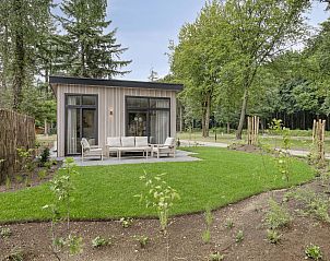 Heidenhof vakantiehuis in Ede, Veluwe met terras en omliggende natuur.