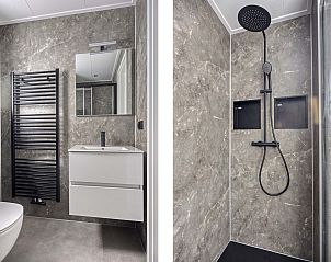 Badkamer en regendouche in Heidenhof vakantiehuis, Ede, Veluwe met stijlvolle afwerking.