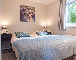 Gezellige slaapkamer in Module Noir vakantiehuis, Ede, Veluwe, voor ultiem comfort.