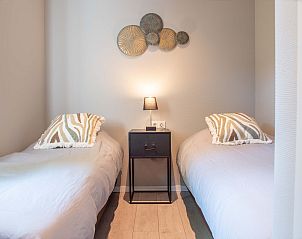 Tweede slaapkamer met twee bedden in Module Noir, Ede, Veluwe.