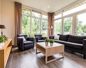 Stilvolle Sitzecke in Modul 5 Personen, Ede, Veluwe. Genieen Sie die Natur von diesem Ferienhaus aus.