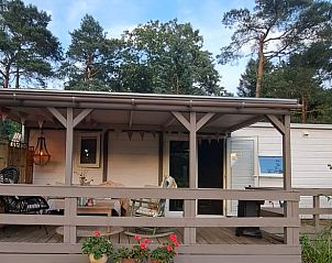 Vakantiehuis in Emst met gezellige veranda, omringd door natuur op de Veluwe, Gelderland. Perfect voor een ontspannen verblijf.