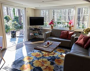 Cozy living room in Holiday Home in Emst, Veluwe, overlooking nature.