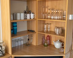 Practical kitchen arrangement in Holiday home in Emst, Veluwe, with china cabinet.