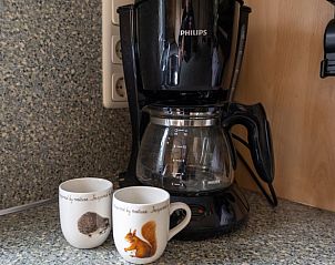 Coffee Corner in Holiday Home in Emst, Gelderland, with coffee maker and mugs.