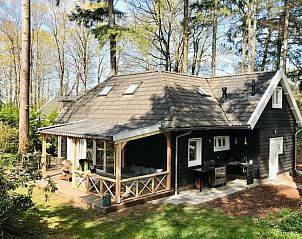 Cozy vacation home Cottage in Emst with veranda in Veluwe, Gelderland.