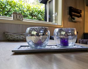 Cozy interior of Huisje in Emst, vacation home in Veluwe, Gelderland, with attractive decoration and natural light.