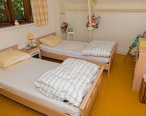 Gezellige kinderkamer in Vakantiehuisje in Emst, perfect voor families op de Veluwe.