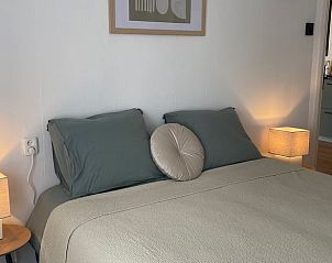 Comfortable double bed in Holiday home in Ermelo, Veluwe, with soft pillows.