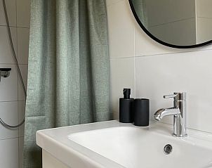 Modern bathroom with shower in Holiday home in Ermelo, Veluwe, for ultimate comfort.