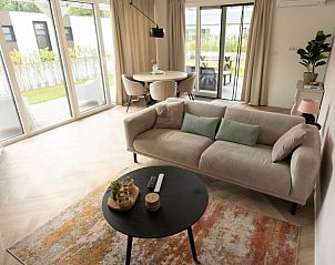 Stijlvolle binnenruimte van Kukeluusje Ermelo, vakantiehuis in Veluwe, Gelderland, met ruime woonkamer.