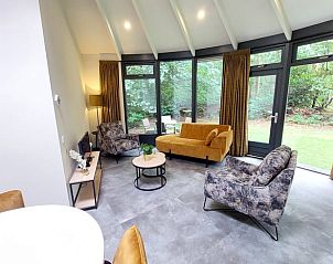 Cozy living room in Holiday home in Ermelo, Veluwe, overlooking the green nature of Gelderland.