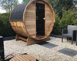 Rustic sauna in the garden of Holiday home in Ermelo, Veluwe, for relaxation.