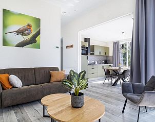 Gemtliche Sitzecke im Ferienhaus Hertenhoeve comfort in Hoenderloo, Veluwe. Perfekt fr entspannte Abende.