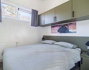Zweites Schlafzimmer im Ferienhaus Deerhoeve comfort in Hoenderloo, Veluwe. Gemtliche Atmosphre und viel Stauraum.
