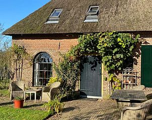 Huisje in Terwolde, vakantiehuis op de Veluwe, met uitnodigend terras en rustieke uitstraling in Gelderland.