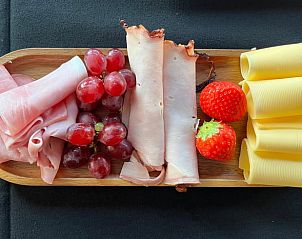 Breakfast board with cheese and cold cuts at Holiday Home in Garderen, Veluwe.