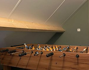 Speelruimte met tafelvoetbal in Vakantiehuis in 't Harde, Veluwe, Gelderland.