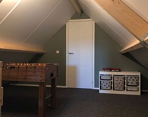 Zolderkamer met speelruimte in Vakantiehuis in 't Harde, Veluwe, ideaal voor kinderen.