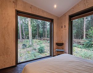 Panoramisch uitzicht vanuit de slaapkamer van Vakantiehuis in 't Harde.