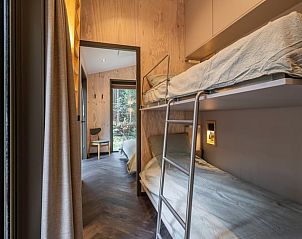 Stapelbed in kindvriendelijke kamer van Vakantiehuis in 't Harde, Veluwe.