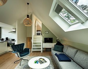 Gemtliches Wohnzimmer des Ferienhauses Sprielderbosch 45 'Skogen' an der Veluwe in Gelderland.