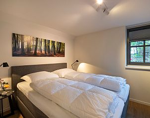 Gemtliche Sitzecke im Ferienhaus Sprielderbosch 45 'Skogen' an der Veluwe in Gelderland.