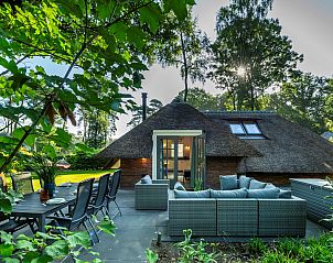 Cozy outdoor space at Holiday home Sprielderbosch 28 'Berkenhoek' in Putten, Veluwe.