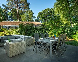 Stylish dining table set at Sprielderbosch 28 'Berkenhoek' on the Veluwe in Putten.