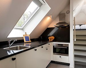 Elegant notebook in the kitchen of Holiday home Sprielderbosch 28 'Berkenhoek'.