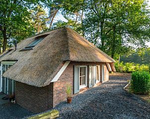 Rustic charm of Holiday home Sprielderbosch 38 The Wooden Owl, surrounded by Veluwe nature in Putten.