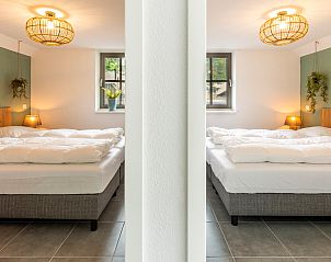 Gezellige slaapkamer in Vakantiewoning Sprielderbosch 44 Green Balance, vakantiehuis in Putten, Veluwe met sfeerverlichting.
