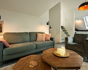 Komfortable Sitzecke im Ferienhaus Sprielderbosch 27 De Uitlaat in Putten, Veluwe, ideal zum Entspannen.