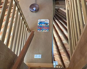 Wooden stairs in Cottage in Voorthuizen, Veluwe, Gelderland, leading to upper floor.