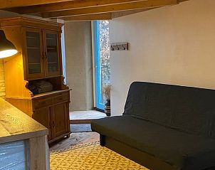 Cozy sitting area in Cottage in Voorthuizen, vacation accommodation in Veluwe, Gelderland, ideal for relaxation.