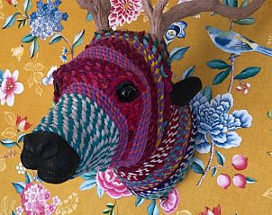 Unique wall decoration in Holiday home in Voorthuizen, Veluwe, with colorful woven deer.