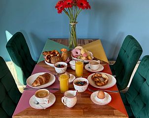 Richly set table at Holiday Home in Voorthuizen, Veluwe, for a delicious breakfast.