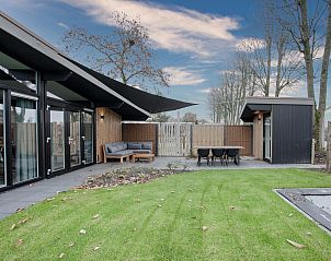 Enjoy the modern outdoor space at Top-Nova Scotia vacation home in Voorthuizen, Veluwe, surrounded by peaceful nature.