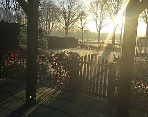 Zonsopgang vanaf de veranda van Vakantiehuis in Hulshorst, Veluwe.