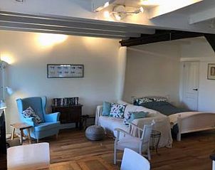 Ruime open woonkamer in vakantiehuis in Hulshorst, ideaal voor familie, Veluwe, Gelderland.