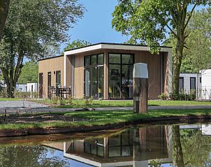 Vakantiehuis L-Cube4 in Hulshorst, Veluwe met moderne architectuur en groene omgeving.