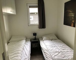 Tweede slaapkamer met twee bedden in Vakantiehuis Superieur 6, Hulshorst, Veluwe.