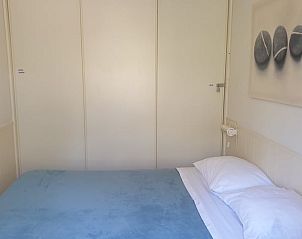 Sfeervolle slaapkamer in Vakantiehuisje in Otterlo, Veluwe, Gelderland.