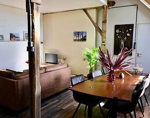 Dining room in Holiday cottage in Epe, Veluwe, Gelderland with modern decor and wooden details.
