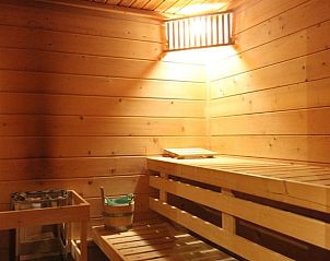 Picnic table in the garden of Cottage in Epe, Veluwe vacation home surrounded by nature.