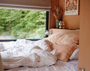 Bedroom with view of nature in Cottage in Nunspeet, Veluwe, Gelderland.