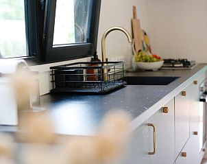 Modern kitchen in Cottage in Nunspeet, vacation home in Veluwe, Gelderland.