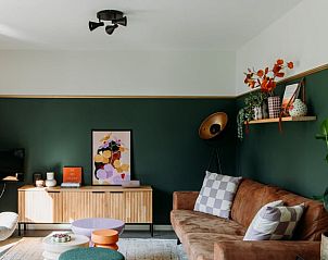 Cozy living room in Holiday home in Nunspeet, Veluwe, with comfortable seating area and stylish decoration.