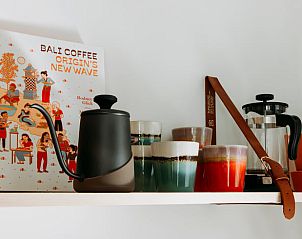 Stylish kitchen accessories in Holiday home in Nunspeet, Veluwe, with colorful mugs and coffee maker.