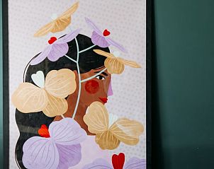 Artwork in Holiday cottage in Nunspeet, Veluwe, with colorful flowers and a female figure.